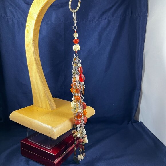 Handcrafted Artisan Autumn Safari Bag Charm With Orange & Earth-Tone Beads Anima - Picture 1 of 2